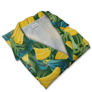 Banana Hawaiian Shirt on Dense Green Monstera Leaf Background