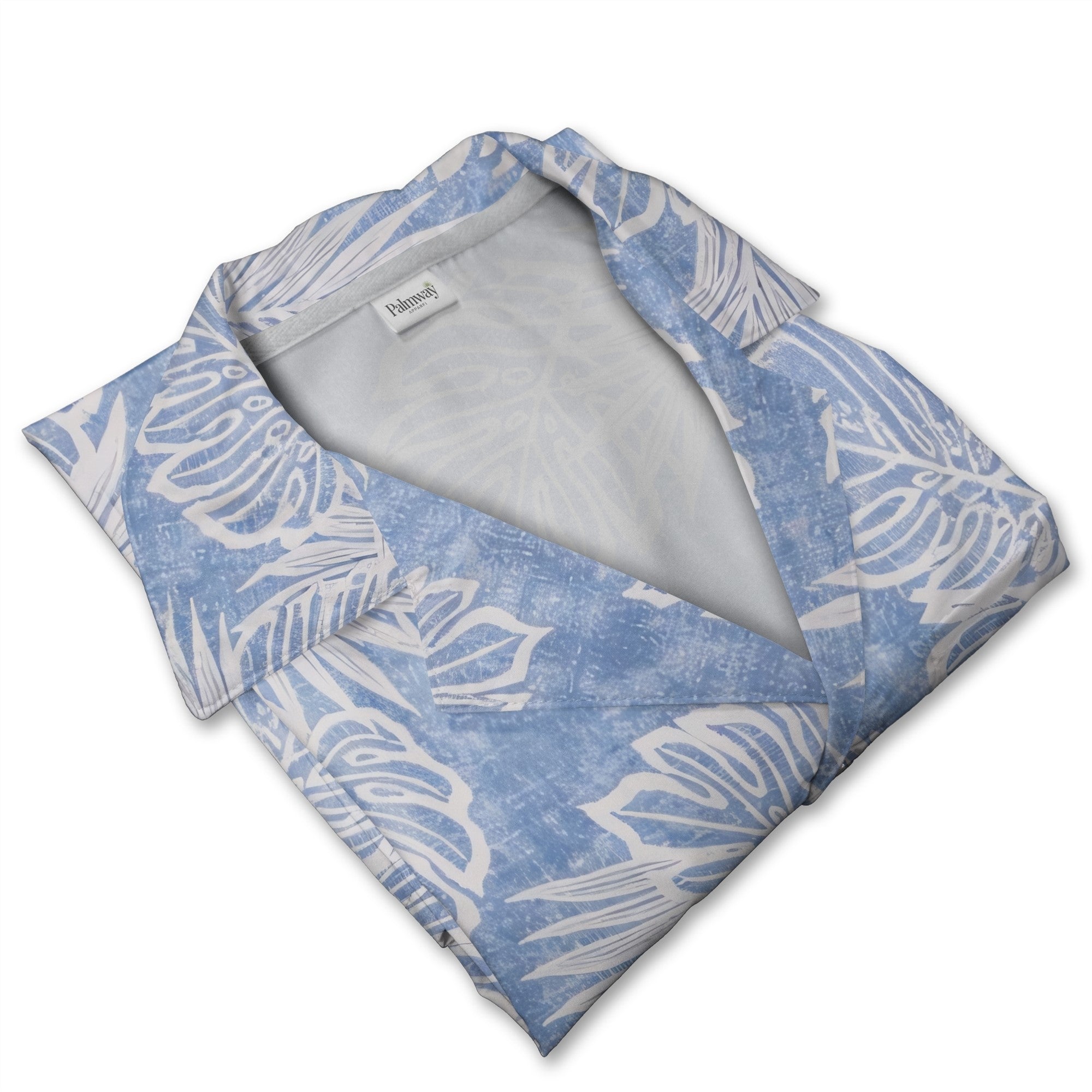 Textured blue Hawaiian shirt with monstera leaves and palm fronds in white outline art